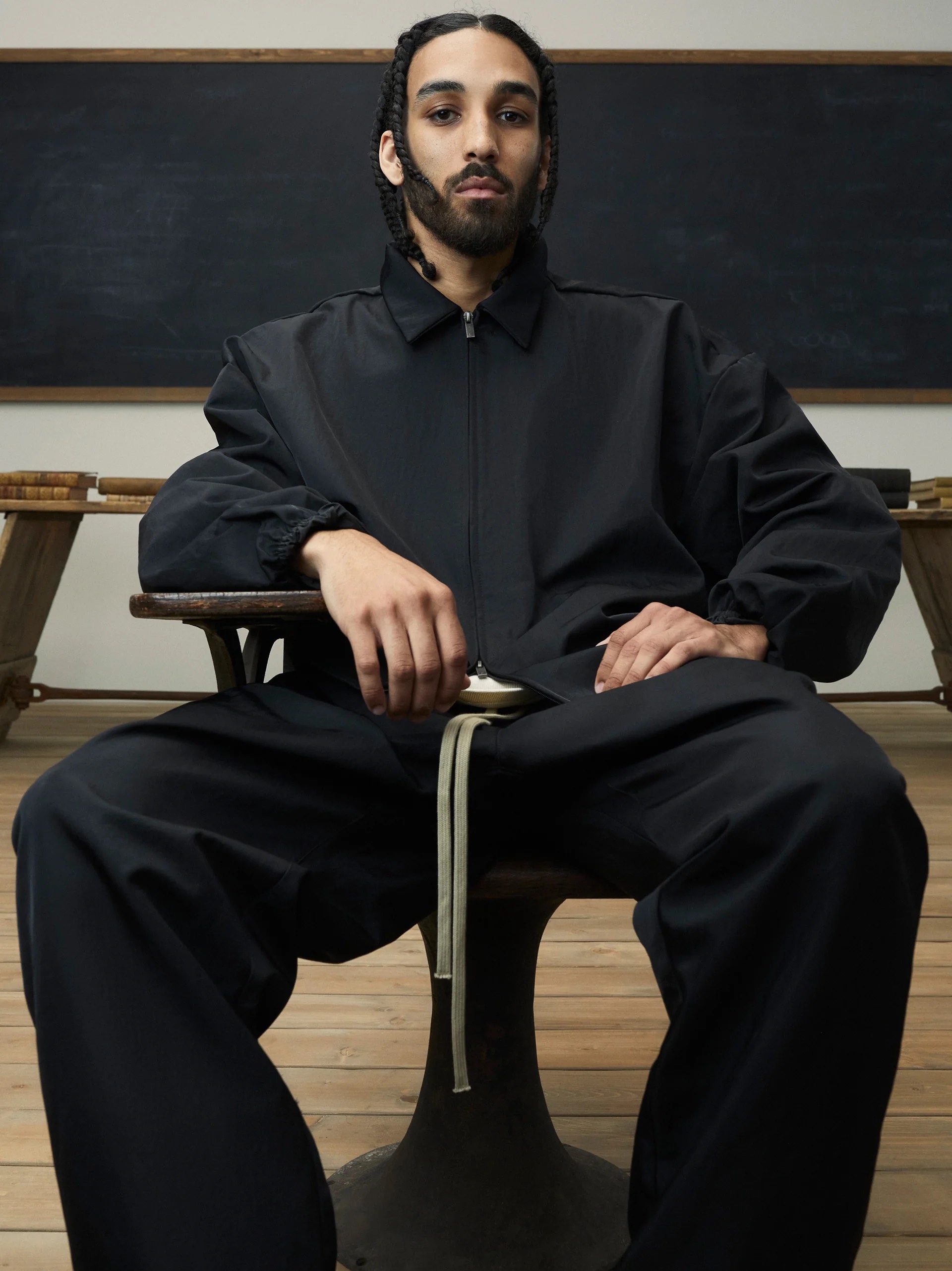 FEAR OF GOD ESSENTIALS 24FW stand collar windbreaker with appliqué letter embroidery.